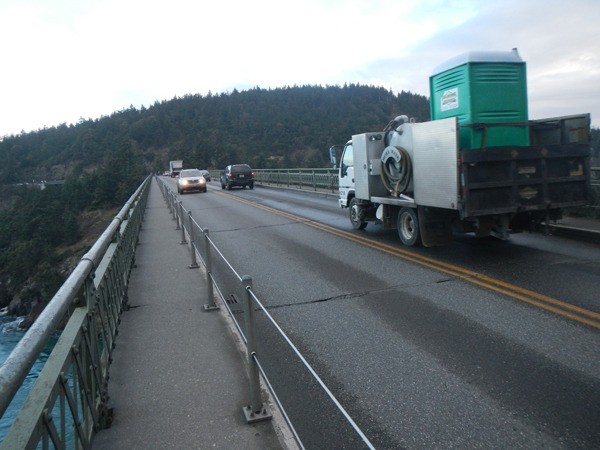 Motorists cross the Deception Pass bridge
