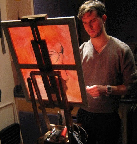 Max Cole Takanikos works at his easel in preparation for the opening of 'A Visual Art and Performance Weekend' at Whidbey Children's Theater Feb. 26 to 28.