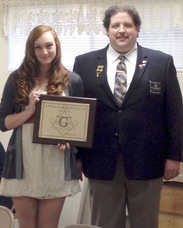 Thomas Gill awards Maddy Jerome a $1