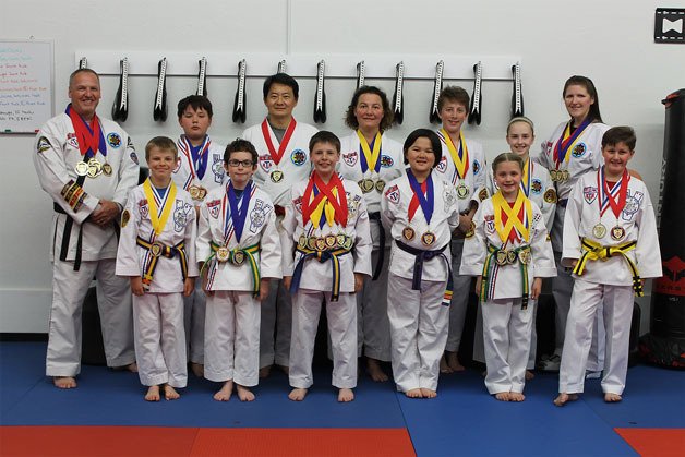 Students and instructors of Armstrong Taekwondo in Clinton. From left to right