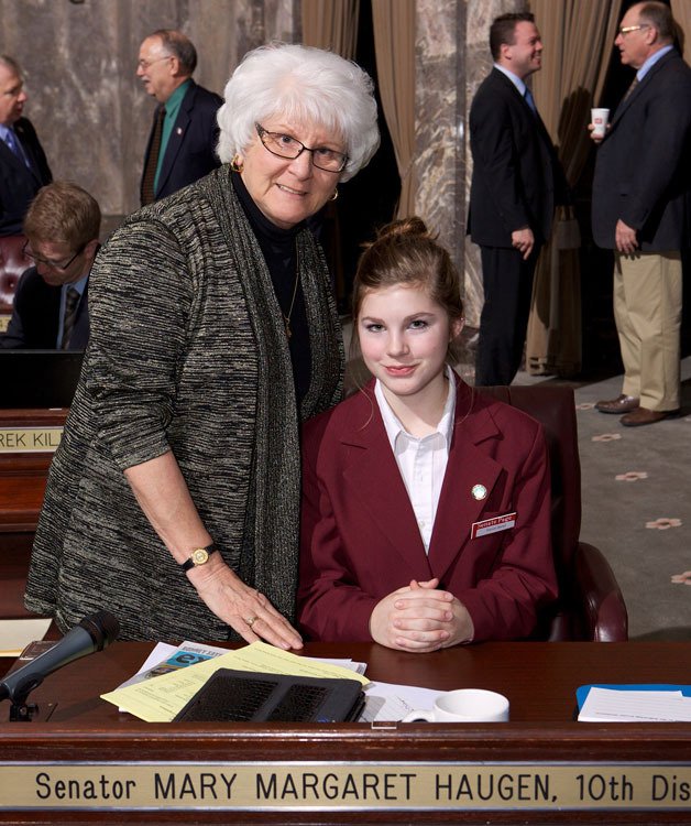 Sen. Mary Margaret Haugen takes a moment to visit Senate page Naomi Bartel who she sponsored for the page program recently.
