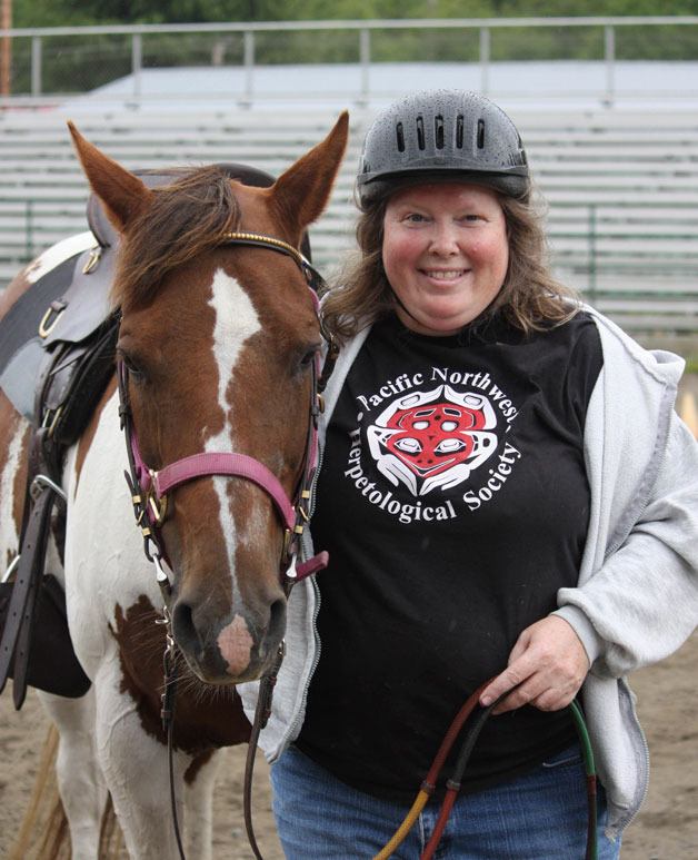 Volunteer award winner Tina Belle Isle pictured with one of her helpers at HOPE Therapeutic Riding Center.