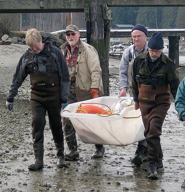 Ken Urstad (second from the left) was named Coastal Volunteer of the Year.
