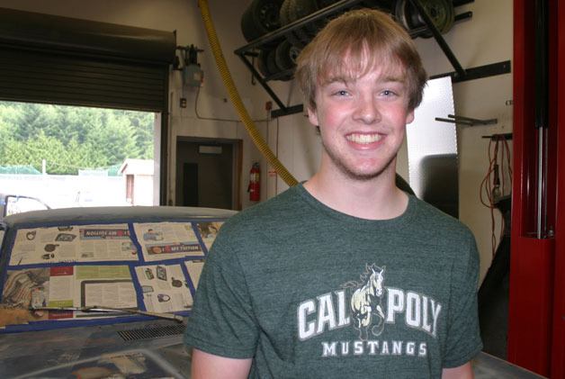 Kellen Field visits the shop at South Whidbey High School. The Cal Poly-bound valedictorian and self-professed car guy plans to pursue a mechanical engineering career.