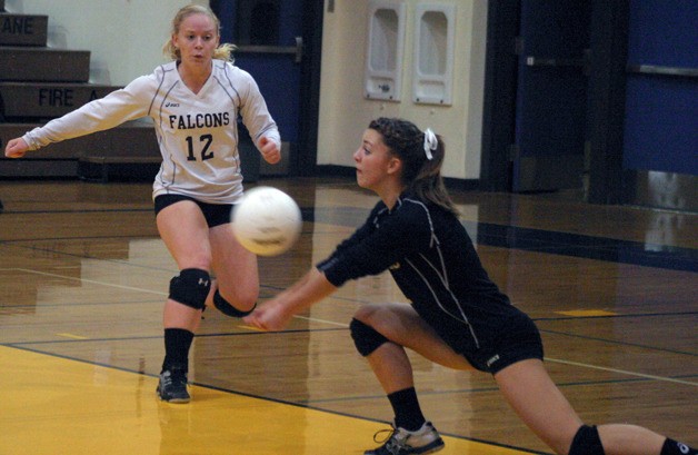 Falcon senior Aly Chapman digs a serve against Lynden Christian in the third set Monday. South Whidbey was quickly dispatched 25-9 in the last set of the District 1 volleyball elimination match.
