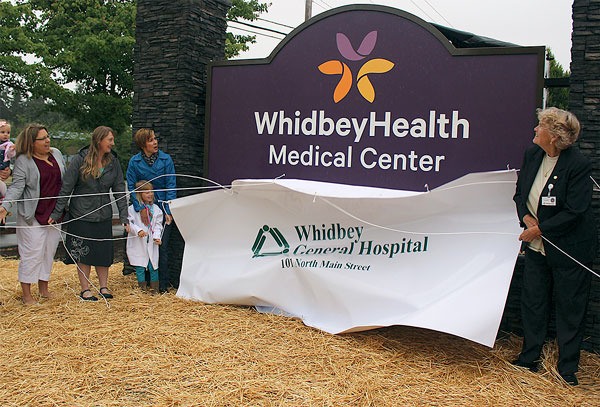 WhidbeyHealth is now officially the umbrella name for the hospital and its services and clinics after its new sign was unveiled Monday