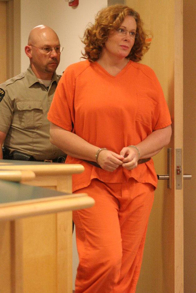 Peggy Sue Thomas enters an Island County courtroom for her bail hearing on Tuesday.
