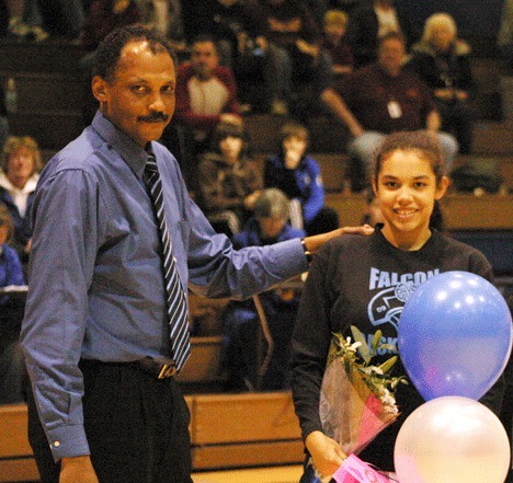 Falcon girls basketball coach Henry Pope celebrates Senior Night with his daughter Samantha in February