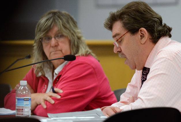Island County Human Services Director Jackie Henderson listens as Island County Recovery Services Manager Mark MacNaughton addresses the Board of Commissioners on Wednesday. The treatment center