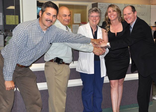 Whidbey General Hospital Chief of Medical Staff Dr. Douglas Langrock stands with WGH CEO Tom Tomasino