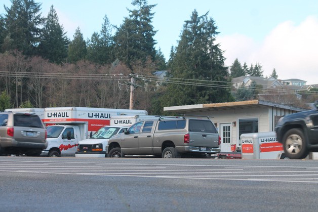Cars on Highway 525 in Clinton zip past by Whidbey Oil Sales and U-Haul Friday morning. The FBI searched the business and a home in the Deer Lake area early Thursday for unknown reasons. Authorities have declined to offer details