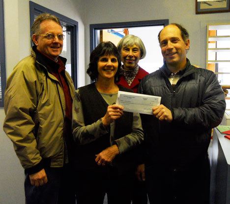 Langley Middle School teachers Leslie Hoelting and Jay Freundlich show off the $1