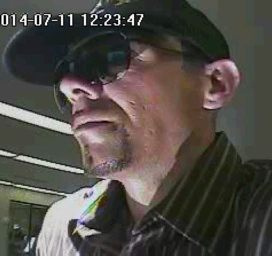 This still from security footage allegedly shows Michael Hardesty during a bank robbery.