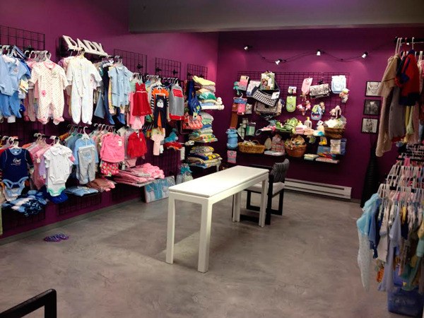 The Pregnancy Care Clinic’s showroom is filled with infant clothing and wares.