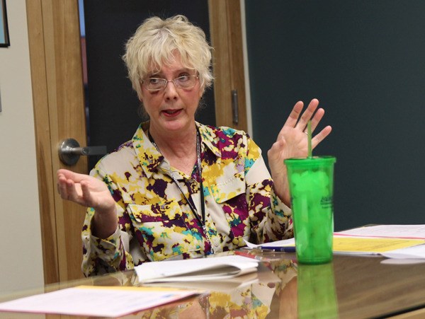 Island Transit Director Martha Rose speaks during a board meeting Friday.