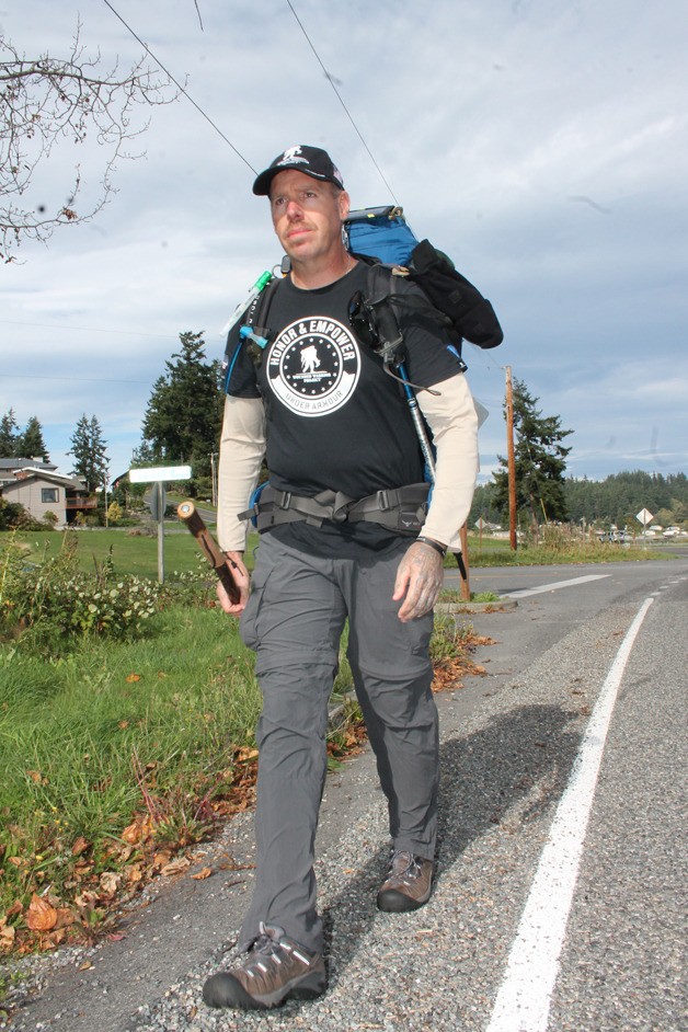 Robert “Dusty” Dawson shows off the gear he will tote for the next two years as he walks across the 50 United States of America. He is starting his trek — a way of raising awareness about veterans for Wounded Warrior Project and the National Coalition for Homeless Veterans — Oct. 1 in Freeland.
