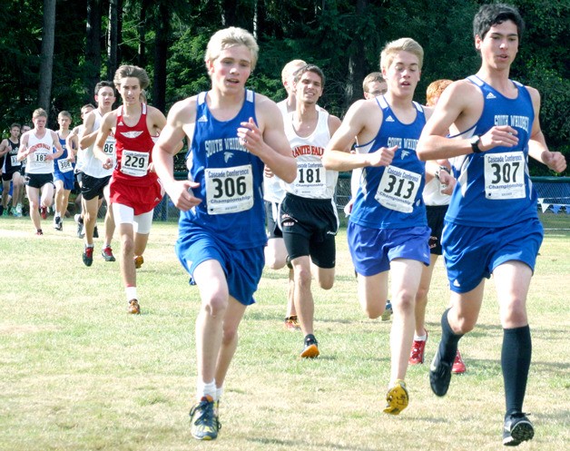 Falcon senior Jhamil Bader-Jarvis leads teammates Chris Anderson and Gavin Imes and other Cascade Conference cross country runners Saturday at the championship meet at South Whidbey High School.