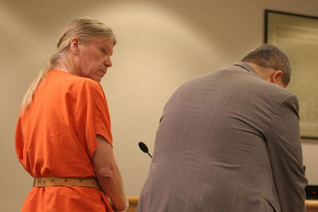 James “Jim” Huden glances at his new lawyer