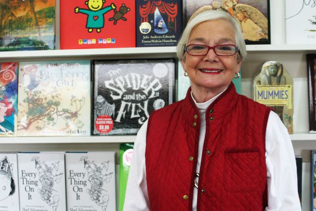 Josh Hauser stands in front of the children’s book section at Moonraker Books in Langley. Hauser started the bookstore 40 years ago this month with her husband Glenn Hauser