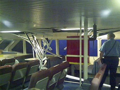 Several cars were damaged when a wave swept over the car deck of the ferry as it crossed between Port Townsend and Whidbey Island.