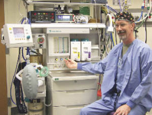 Dr. Chris Outlund is at work in the hospital’s surgical anesthesia area.