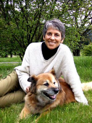 Animal communicator Jacqueline Sowell spends time with her dog Little Bear.