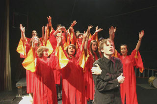 Mark Arand leads a chorus of his fellow schoolmates and singers in the gospel-like “Flying Home” from Jason Robert Brown’s “Songs for a New World.” The show opens at 7:30 p.m. Thursday