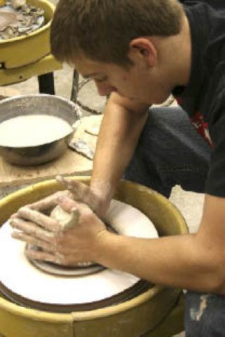 Hunter Hawkens works at the potter’s wheel during Rich Conover’s advanced ceramics class at South Whidbey High School. Hawkens will be showing his ceramic artwork along with his classmates at the “Formula of Fire” show at the Front Room Gallery in the Bayview Cash Store. The show runs May 31 through June 3.