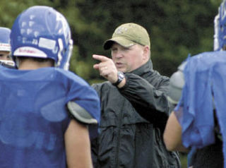 Falcon head football coach Mark Hodson may lose his job due to budget cuts at South Whidbey High School.