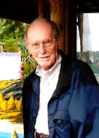 Artist Robert Fansler is being paid tribute by the Artists of South Whidbey for his status of having been with the group the longest. Pictured is the artist in his studio.