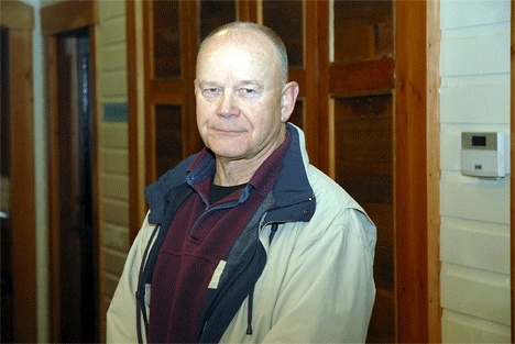 Freeland incorporation critic Stan Walker fears property taxes will rise without improvement of services to Holmes Harbor.