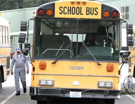 South Whidbey School District mechanic Skip Stephens inspects Bus No. 3