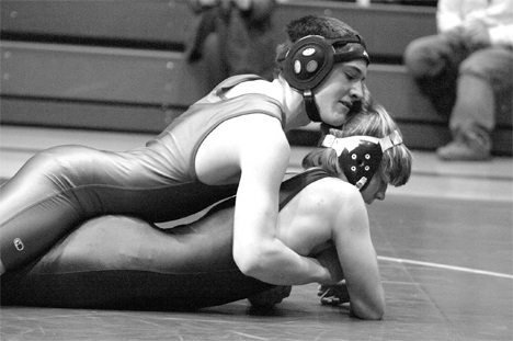 Falcon Daniel Childers overcomes his Lakewood opponent Tuesday. In the second round he pinned his man with an interior reverse and take down. South Whidbey won 43-30 for a tie for first place with Cedarcrest but lost the crown to Archbishop Murphy two days later. The Falcon grapplers begin district playoffs on Feb. 2.
