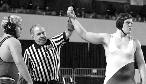 Falcon heavyweight Trapper Rawls celebrates his 40-second-long first victory  over Bryce Wells from Eatonville  on his way to fourth place at the Mat Classic state finals in the Tacoma Dome.