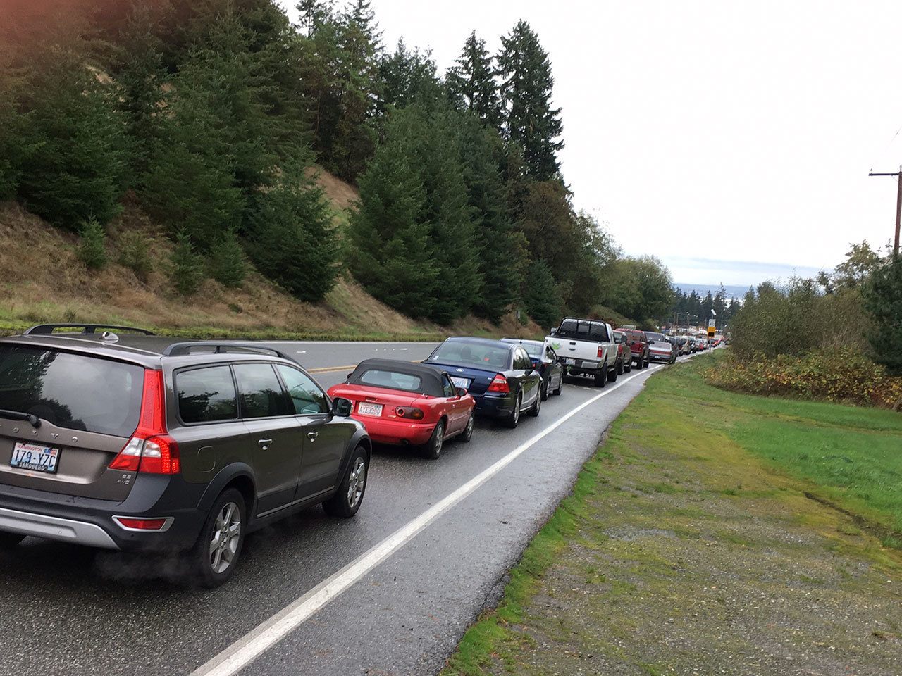 Photo courtesy of Sue Ellen White                                Motorists sit waiting for the ferry in Clinton on Tuesday. Lines were consistently more than two hours this week due to ferry shuffle in the system.