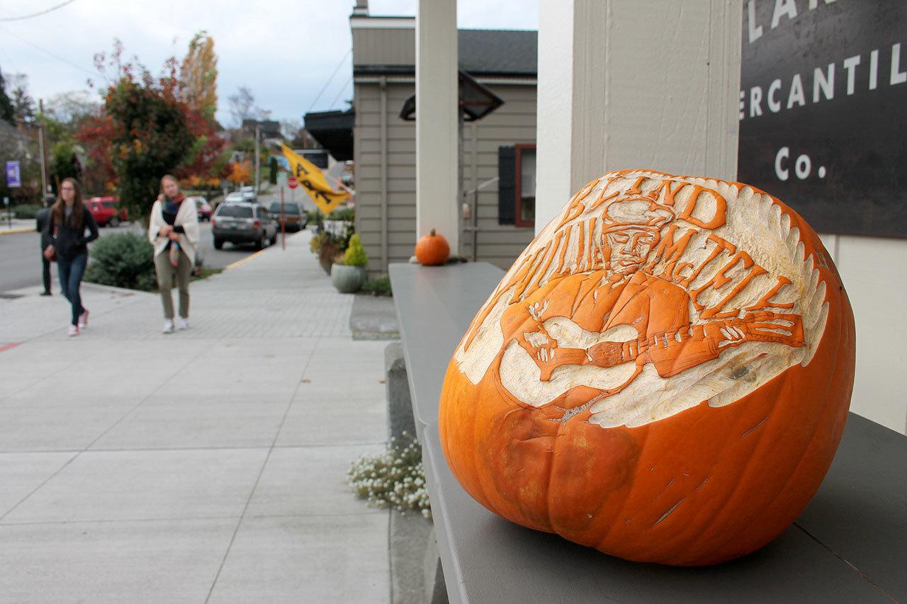 Kyle Jensen / The Record Pumpkins outside Kalakala Mercantile Co. in Langley give people a taste of the carving competition that will happen at the shop Friday evening.