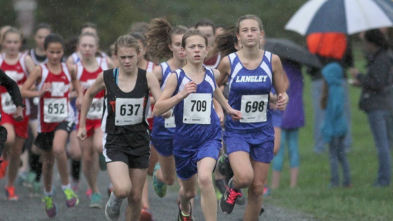 Matt Simms photo                                Langley Middle School eighth-grader Kaia Swegler-Richmond (front) leads the pack at the Cascade Conference Championships on Oct. 20 at River Meadows Park in Granite Falls. Swegler-Richmond won the league meet for the second year in a row.