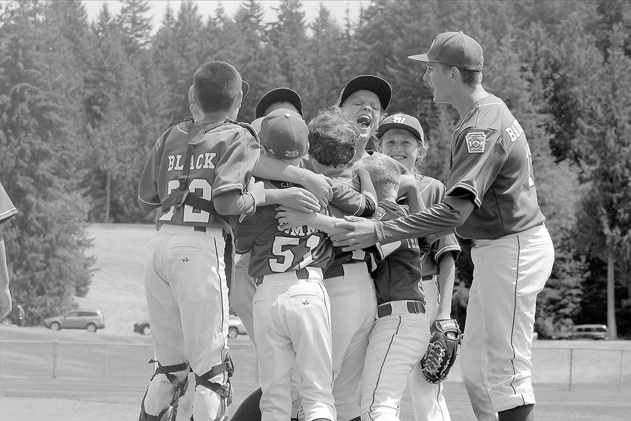 Evan Thompson / The Record The South Whidbey Record and its staff took home some awards from the Washington Newspaper Publishers Association’s 2016 better newspaper contest. Record reporter Evan Thompson’s photo of South Whidbey’s 11/12 All-Star Little League team earned second place in the Black and White Action Photos.