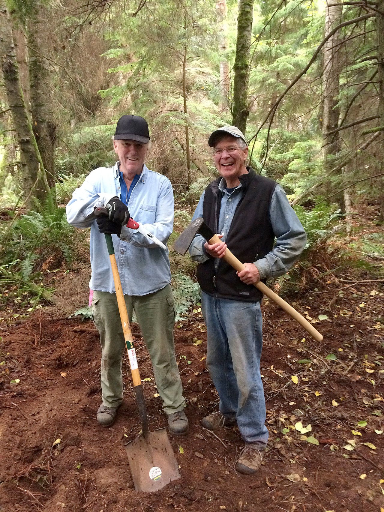 Contributed photo Tom Cahill (left) and John Barney (right) participated in a Whidbey Camano Land Trust trail-building work party at Trillium Community Forest on Friday, Sept. 23.