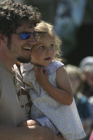 Evan and Emma Callahan of Clinton dance to the bluegrass sounds of Spoonshine in front of the Choochokam Main Stage on Sunday. The annual festival featured more than 50 musical acts on four stages this year.