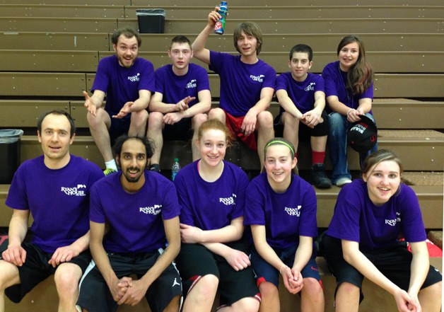 The Ryan’s House For Youth team celebrates the end of the March Madness South Whidbey Style charity basketball tournament on March 24.