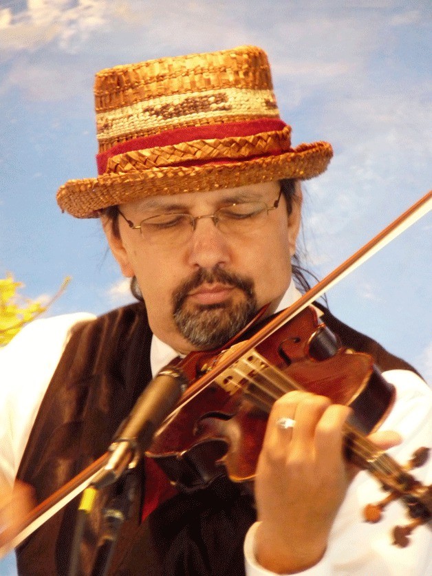 Swil Kanim performs at Greenbank Farm during the Brave New Words poetry festival.  He returns to Whidbey Island this Saturday for two free events.