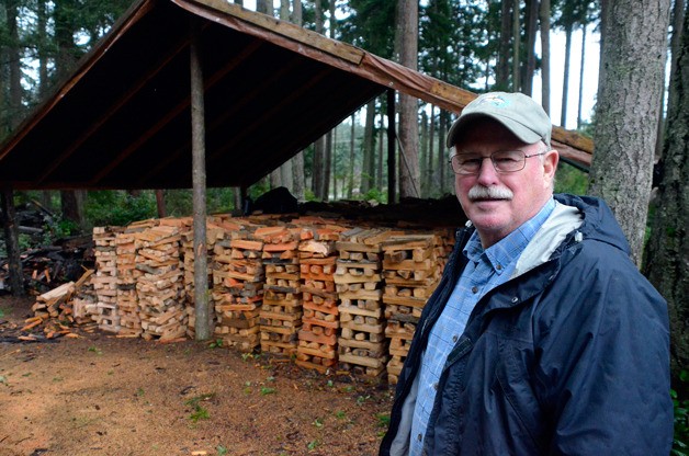 Ken Goff has amassed several cords of split wood used by South Whidbey Community Church to give to people needing wood for heating their homes. The wood splitter was stolen this week.
