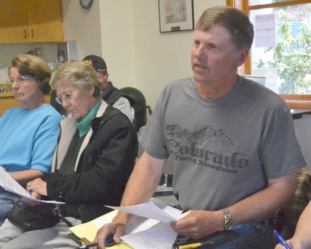 Ray Gabelein argues during discussion of the well monitoring report at the Diking District 1 meeting Aug. 1. He is a former diking commissioner.