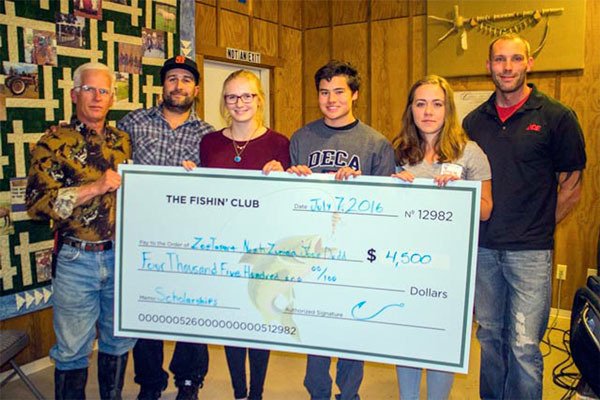 The Fishin’ Club presents a check to the recipients. From left to right: Left to right:  Kevin Lungren