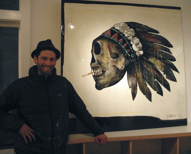 John Sarkis poses with his ‘American Spirit’ painting