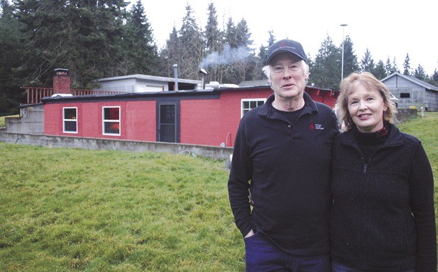 Steven and Beverly Heising outside the bunker that houses their new distilling operation.