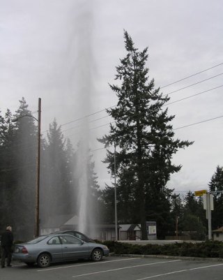 Drivers along Highway 525 were treated to a watery spectacle Tuesday as a broken line sent a geyser 30 feet into the air at the Clinton Post Office.