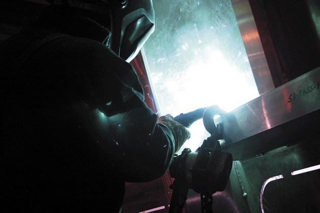 Rudy Benavidez welds a section inside the superstructure for the newest state ferry being built by Nichols Brothers in Freeland.