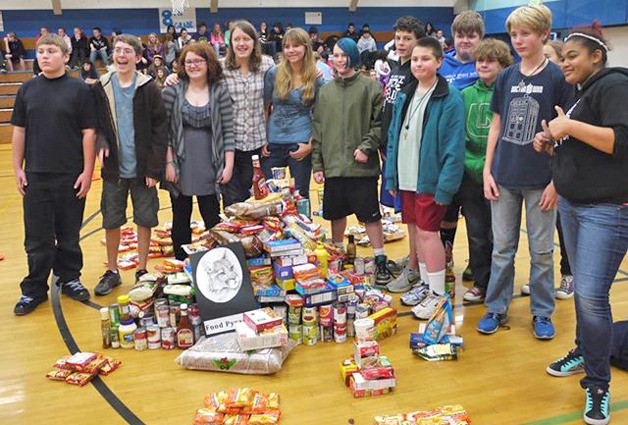 Students in the 8th grade at Langley Middle School collected the most food during the “Scare Hunger Food Drive.”
